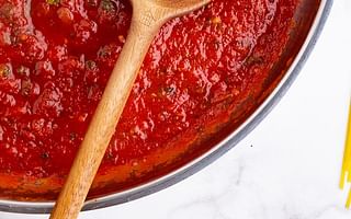 What are the common ingredients used in making tomato sauce?